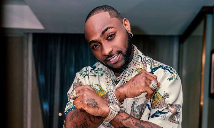 "Wow! he so charming" Fans reacts as Davido shows off dance moves, chills with FIFA official Bernard, others in Qatar (Video)