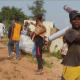 Moment Nigerian Economic Hardship Drives FCT Abuja Residents to Loot NEMA Warehouse (Video)